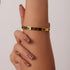 Emerald bangle 18K